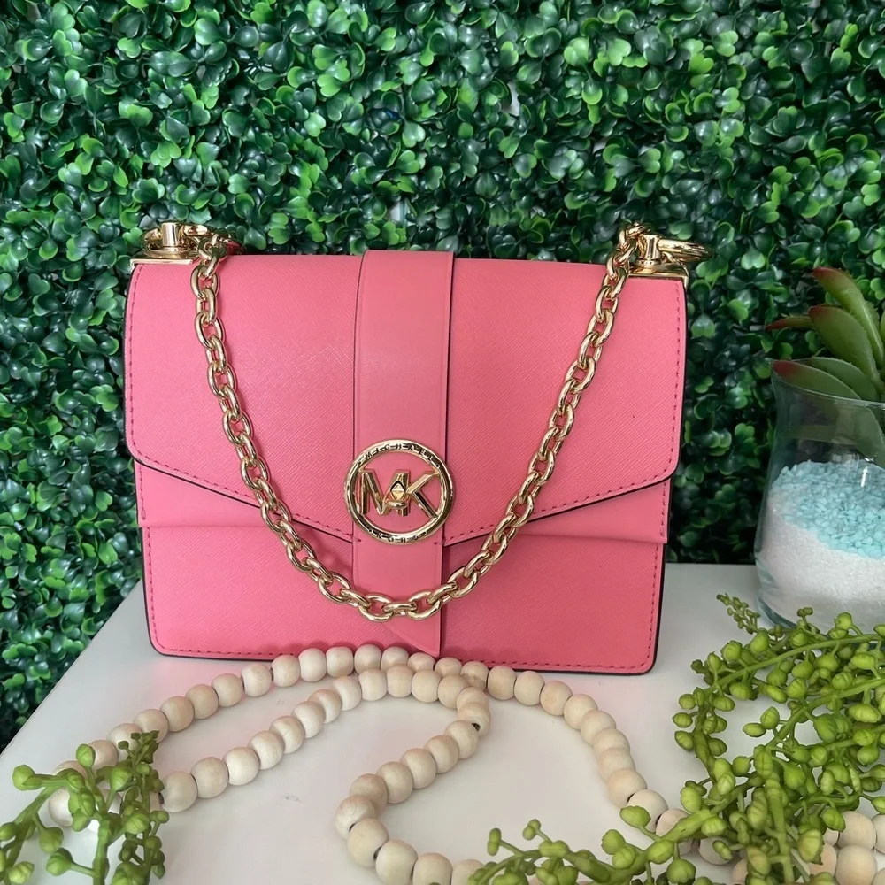 Michael‎ Kors pink Crossbody bag.